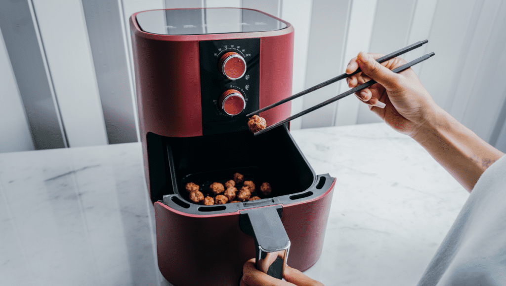 Red Airfryer with Chicken Poppers