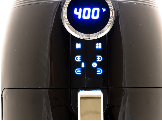 Close-up of a black air fryer with a digital display showing 400°F.